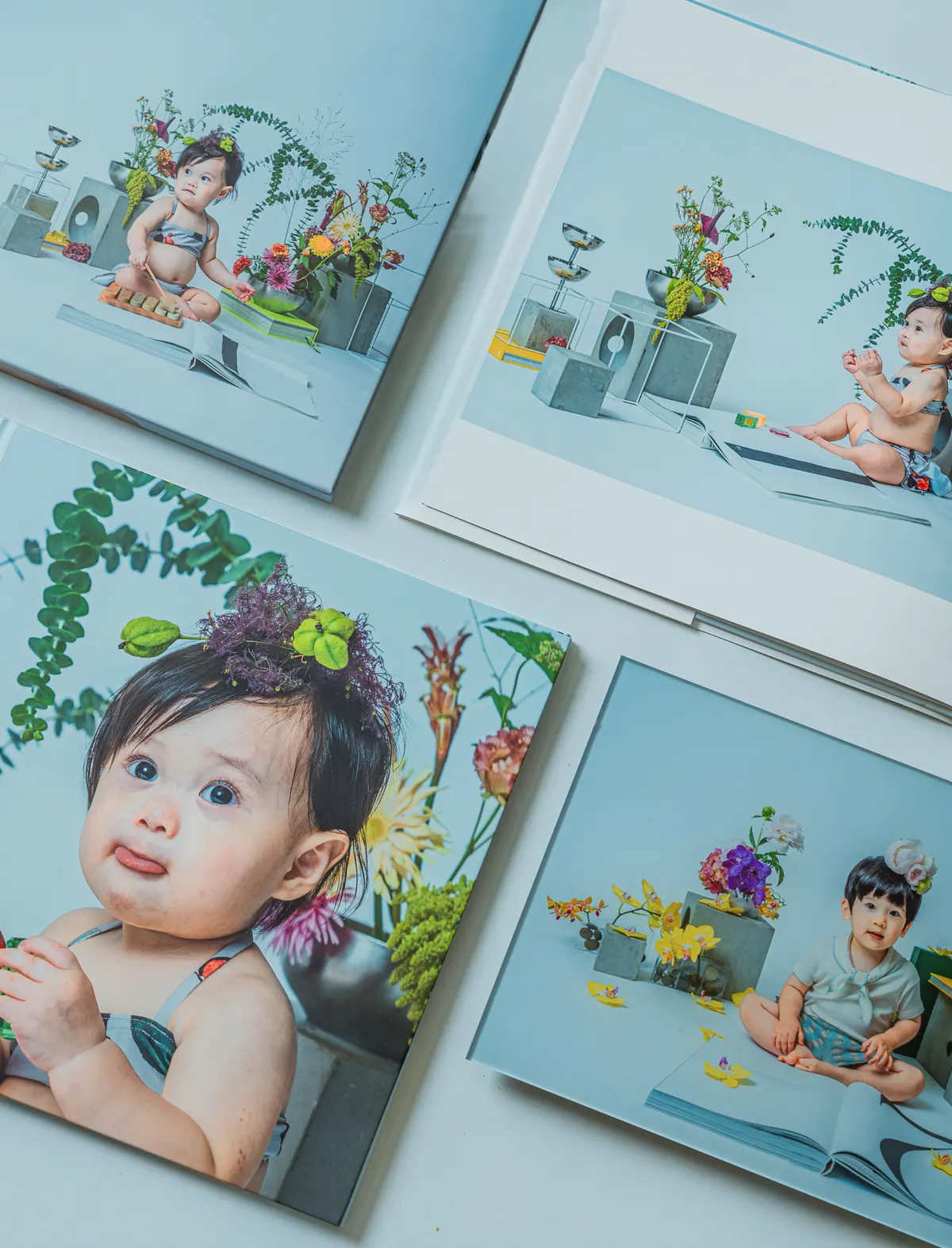 赤ちゃんの写真を収めた Fine Art Album の作品集