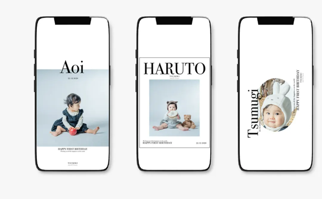 りんごを持つベビーの待受デザインを表示したスマートフォン